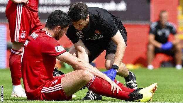 Aberdeen defender Scott McKenna was injured against Rangers on Sunday