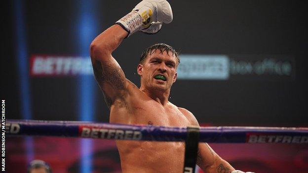 Usyk celebrates