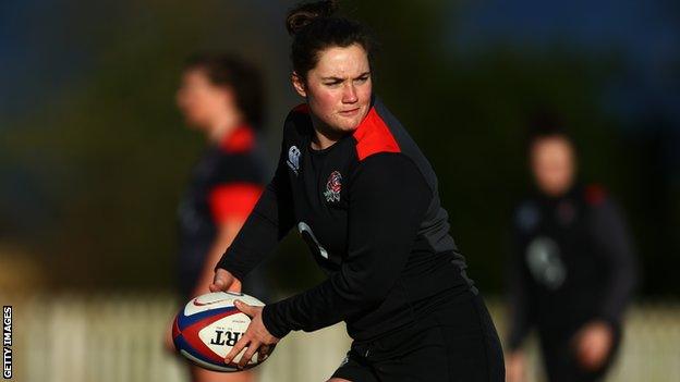 Poppy Leitch passes the ball in training
