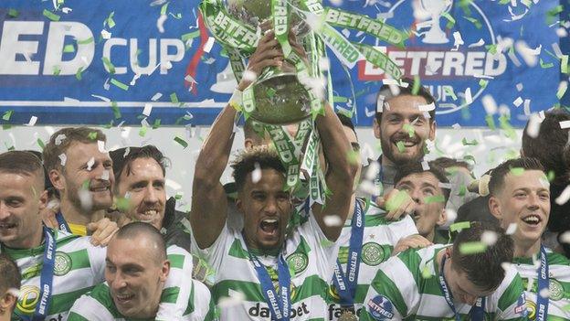 Celtic winger Scott Sinclair lifts the Scottish League Cup