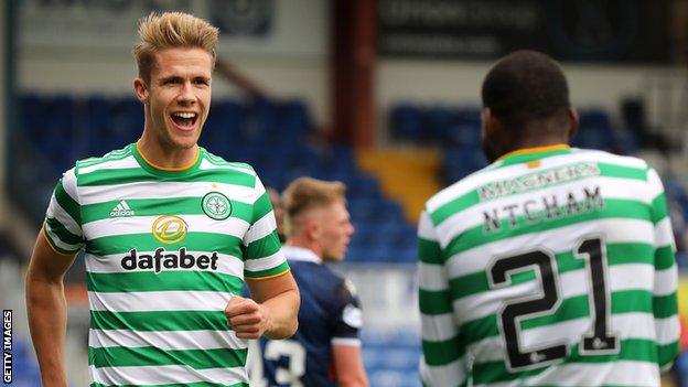 New Brentford signing Kristoffer Ajer celebrates scoring a goal for previous side Celtic