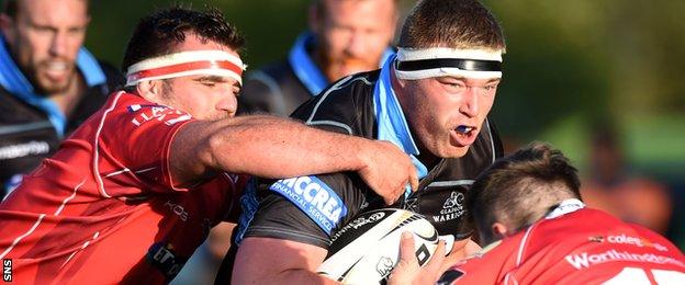 Scarlets tackle Glasgow's Alex Allen