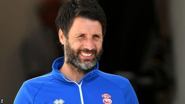 Lincoln manager Danny Cowley looks on