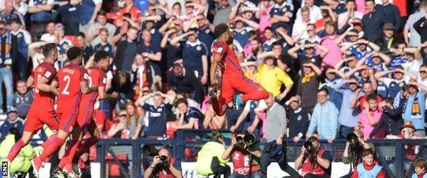 Alex Oxlade-Chamberlain celebrates