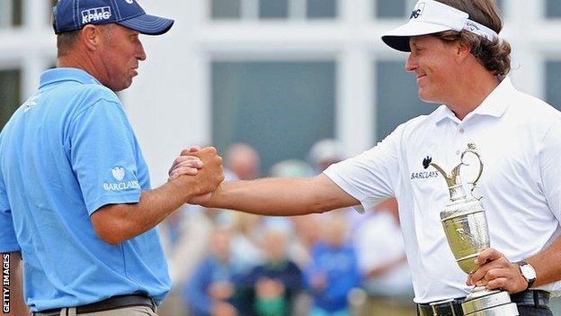 (l-r) Jim 'Bones' Mackay and Phil Mickelson with the Claret Jug