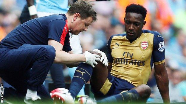 Danny Welbeck is treated at Etihad Stadium