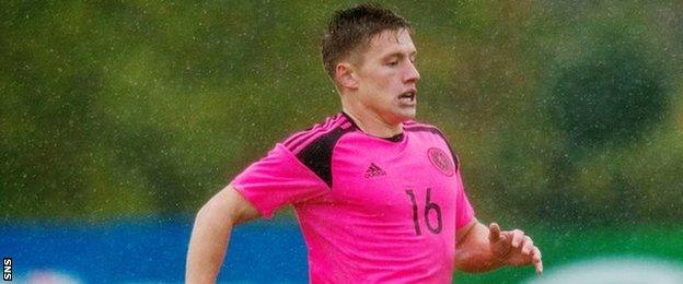 Greg Docherty in action for Scotland Under-21s