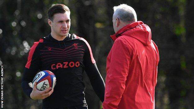 Taine Basham in conversation with Wales coach Wayne Pivac