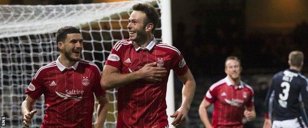 Andrew Considine celebrates his first ever hat-trick in the win at Dundee on Friday night