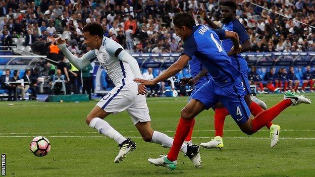 Raphael Varane and Dele Alli