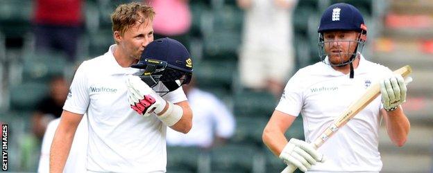 Joe Root celebrates his century