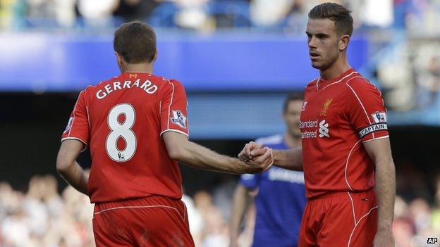 Jordan Henderson shakes hands with Steven Gerrard.