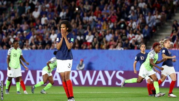 Wendie Renard reacts after missing her penalty