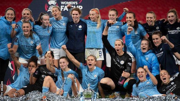 Manchester City celebrating winning the FA Cup