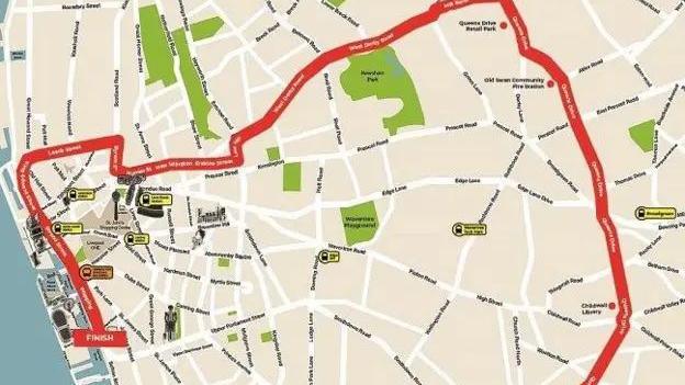 The image shows parade mapa thick red line delineates the route.