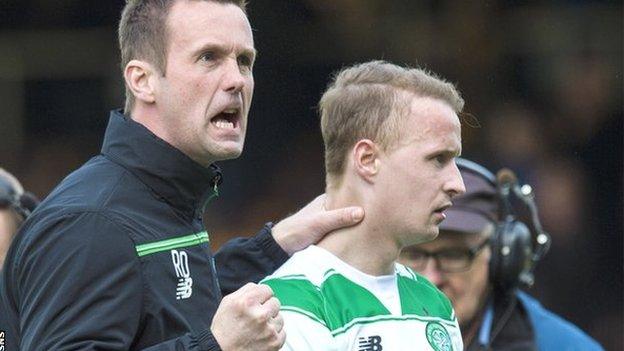 Celtic boss Ronny Deila celebrates victory over Motherwell with striker Leigh Griffiths