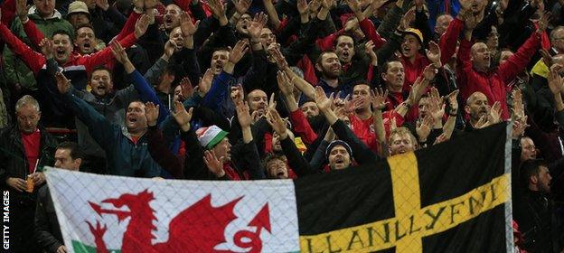 Wales fans celebrating in Bosnia-Herzegovina