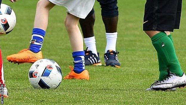 Children playing football