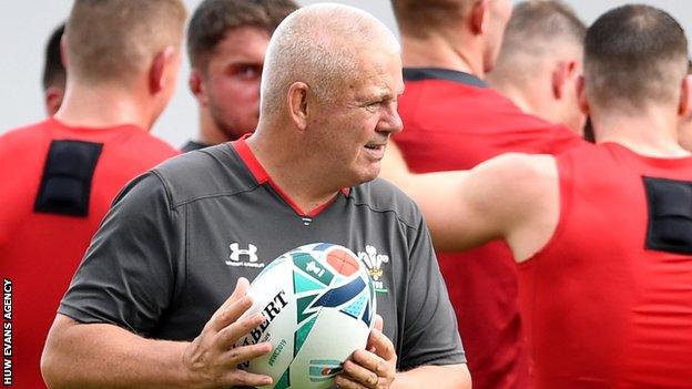 Wales coach Warren Gatland handles the ball in training