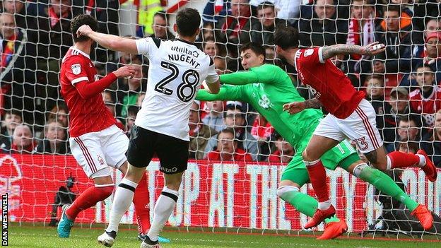 Costel Pantilimon saves a David Nugent shot