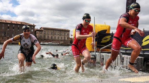 Georgia Taylor-Brown (centre) won the women's Super League Triathlon race in Toulouse earlier in October