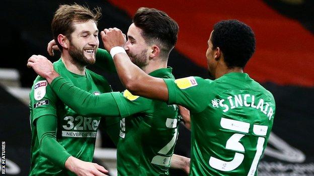 Tom Barkhuizen (left) has now scored three goals in his past four games for Preston North End