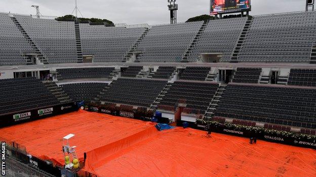 A wet scene at the Italian Open on Wednesday