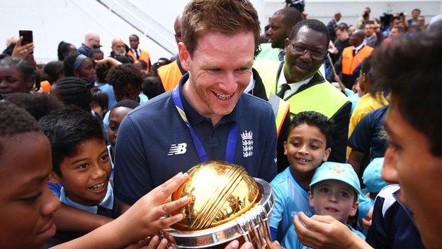 England captain Eoin Morgan shows off the World Cup trophy