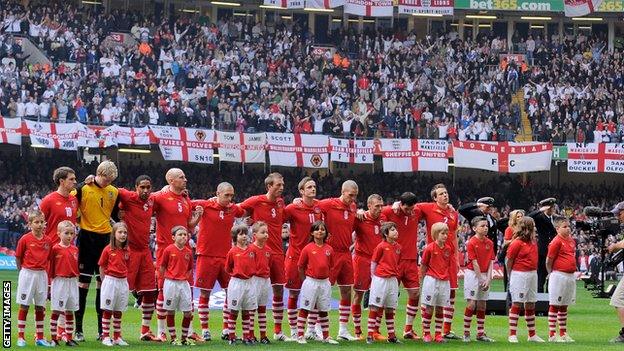 Wales line up before facing England at Cardiff's showpiece venue in 2011