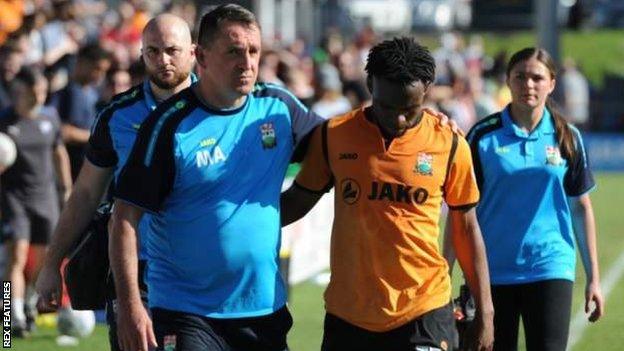 Martin Allen consoles his Barnet players