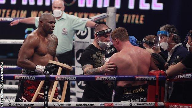 Whyte was keen to help Povetkin as the Russian recovered from the knockdown in his corner and carries a stool for him to sit on