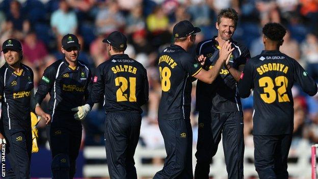 Glamorgan players celebrating a wicket