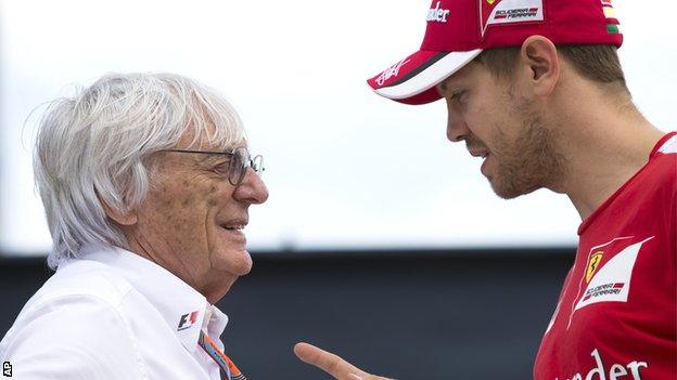 Bernie Ecclestone (left) and Sebastian Vettel