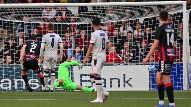 BJ Burns steers the ball past Basel keeper Marwin Hitz for the second-half equaliser