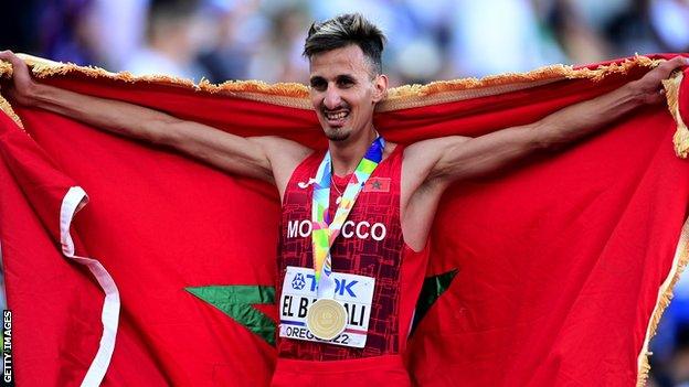 Soufiane El Bakkali celebrates his 3000m steeplechase win at the World Athletics Championships