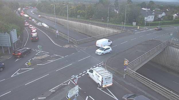 Vehicles can be seen queuing around the Britannia Bridge, in this image taken from a traffic camera.