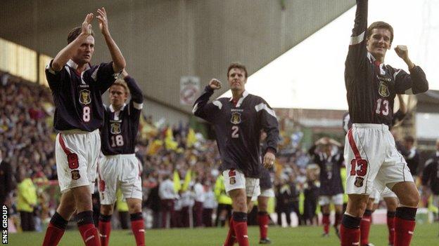 Paul Lambert (left) applauds fans after securing World Cup qualification at Celtic Park