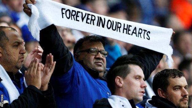 Fans were given scarves as they paid their respects