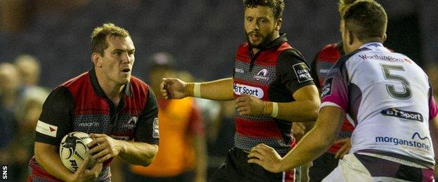 Neil Cochrane (left) in action for Edinburgh