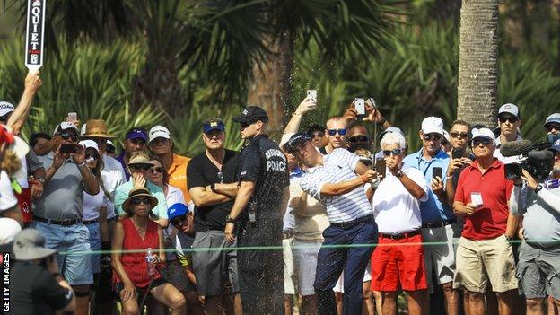 Justin Thomas plays a shot from the rough on hole three during the first round of the Honda Classic at PGA National Resort and Spa