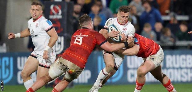 Michael Lowry is tackled by Munster