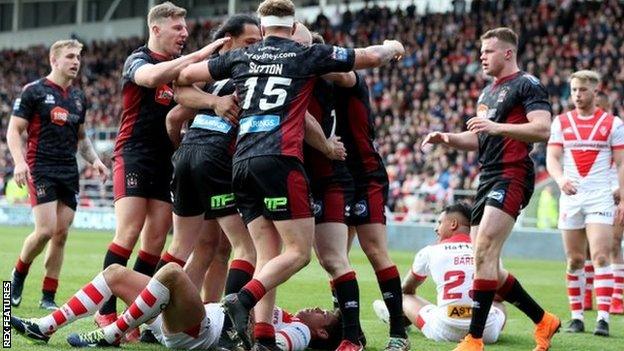 Joel Tomkins came off the bench to score two of Wigan's three tries