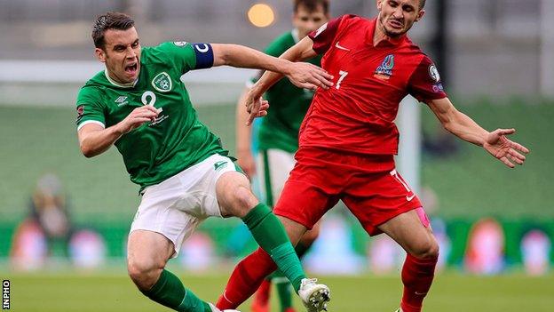 Seamus Coleman battles with Azerbaijan's Maksim Alaskarov in the World Cup qualifier in Dublin during September