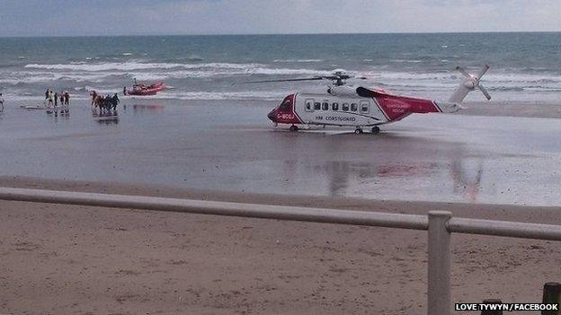 A rescue helicopter was called to the incident at Tywyn beach