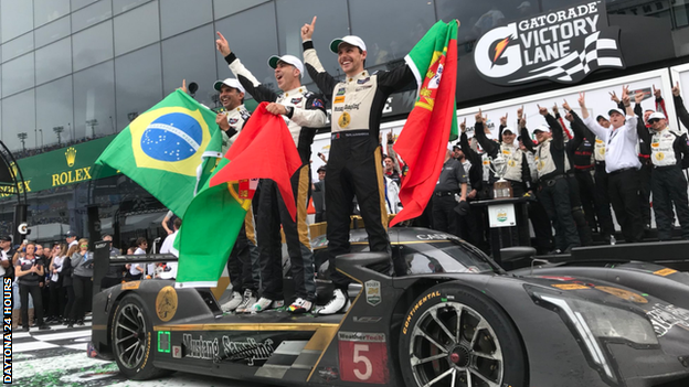 Filipe Albuquerque, Christian Fittipaldi and Joao Barbosa celebrate their win in the Daytona 24 Hours