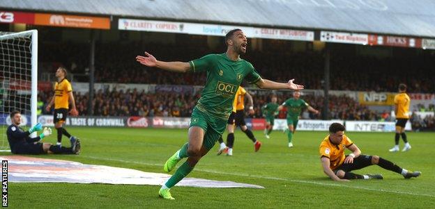 CJ Hamilton celebrates after his brilliant goal put Mansfield ahead in the tie