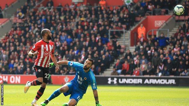 Nathan Redmond (left) scores