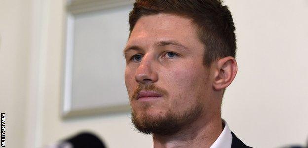 Australia batsman Cameron Bancroft prepares to speak at a news conference