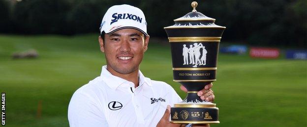 Hideki Matsuyama with the WGC HSBC Champions trophy