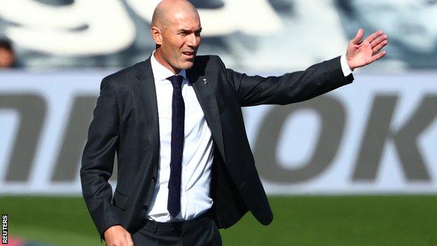 Real Madrid boss Zinedine Zidane reacts during a match